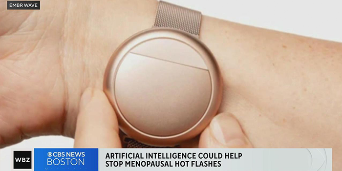 closeup image of Rose Gold Embr Wave wristband with CBS News Boston logo, "Artificial Intelligence could help stop menopausal hot flashes"