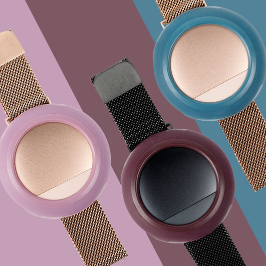 Three Embr Wave devices (Rose Gold and Black) with Comfort Cases in Soft Orchid, Merlot, and Lagoon on a color-blocked background