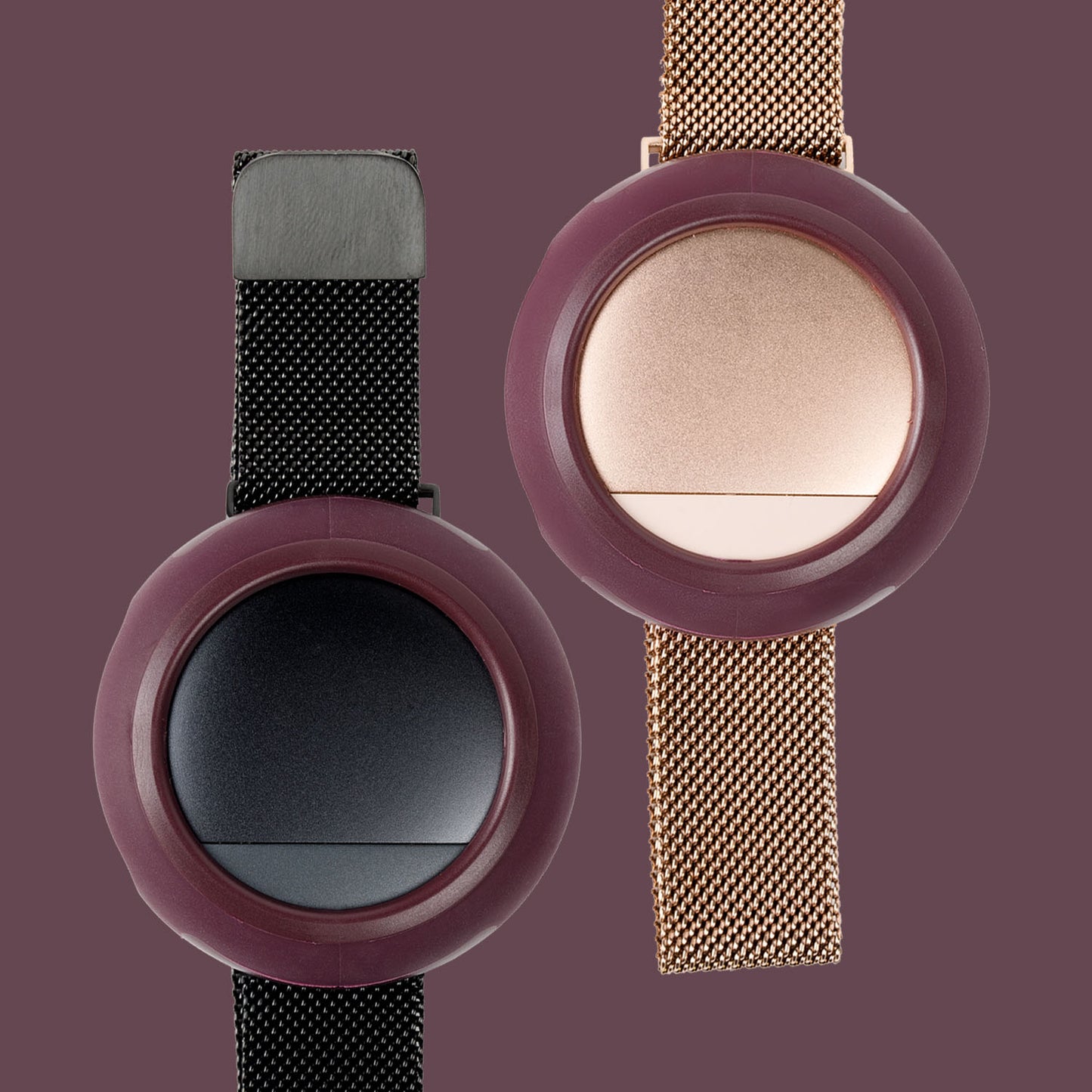 Two Embr Wave devices (Rose Gold and Black) with Comfort Cases in Merlot on a burgundy background